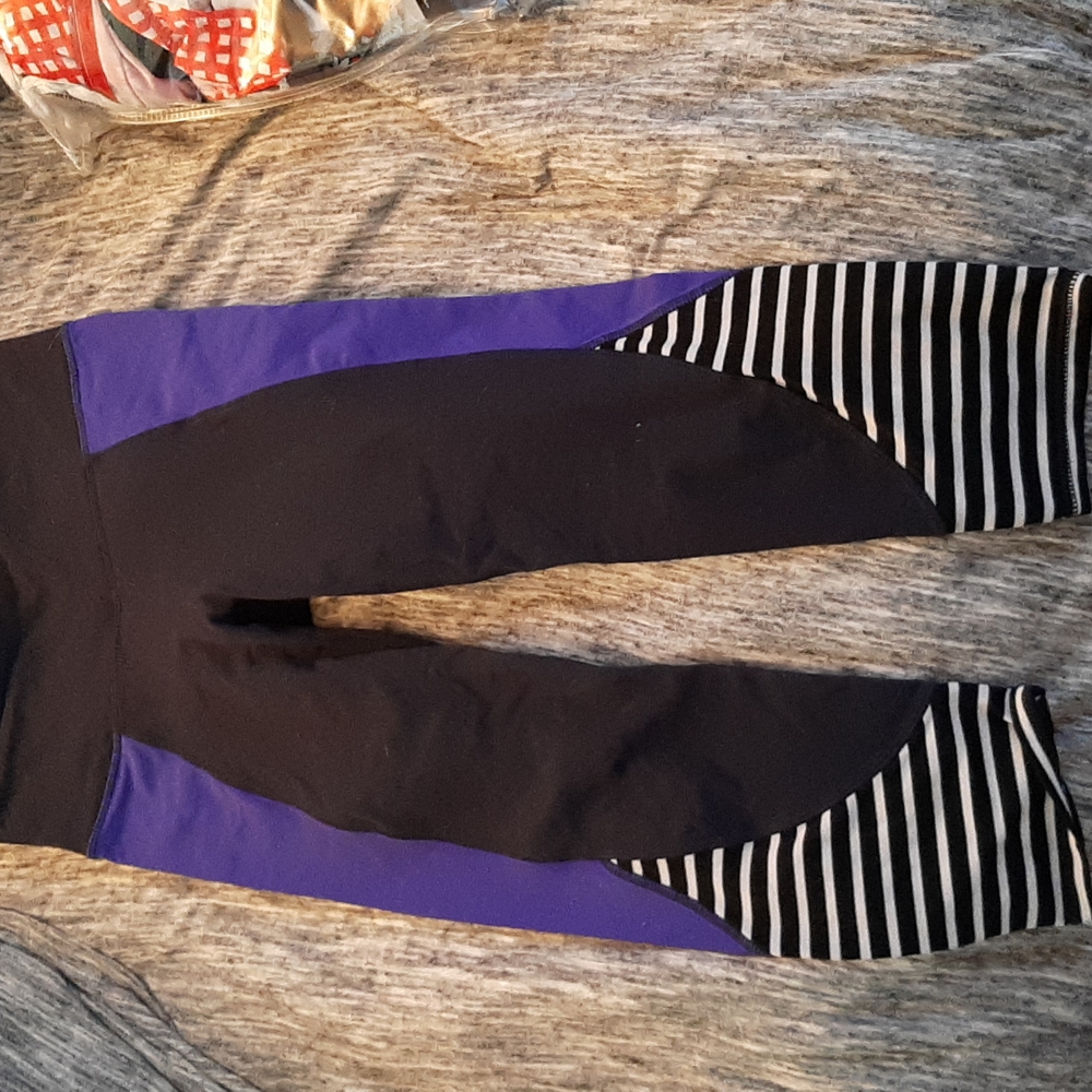 S small Athleta cropped leggings, black w purple outer legs, striped bottoms